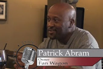 Ron Stark sits with Patrick Abram Owner of Fan Wagon